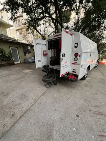 Magnet Plumbing service vehicle on-site for Grease Trap Cleaning in Carmichael
